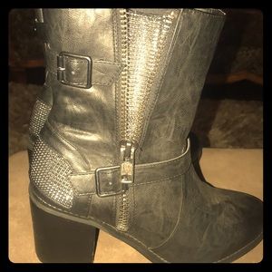 Half boots with rhinestone heal and zipper Inlet.